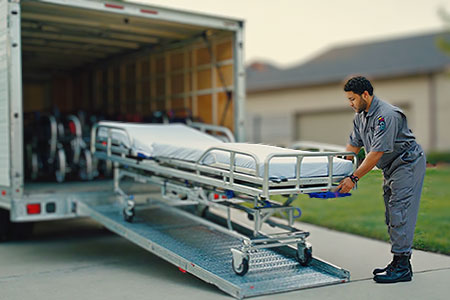 DME Delivery tech unloading DME equipment from truck - uses Serious ERP DME fulfillment app to complete order